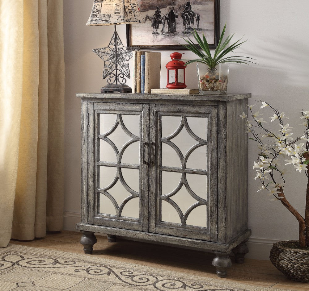 Storage cabinet with 2 doors featuring diamond mirror trim in weathered gray finish.