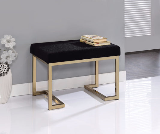 Astonishing Ottoman with black fabric cushion and gold metal frame