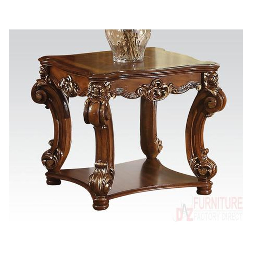 Square-top end table with scrolled legs and bottom shelf in cherry brown finish.