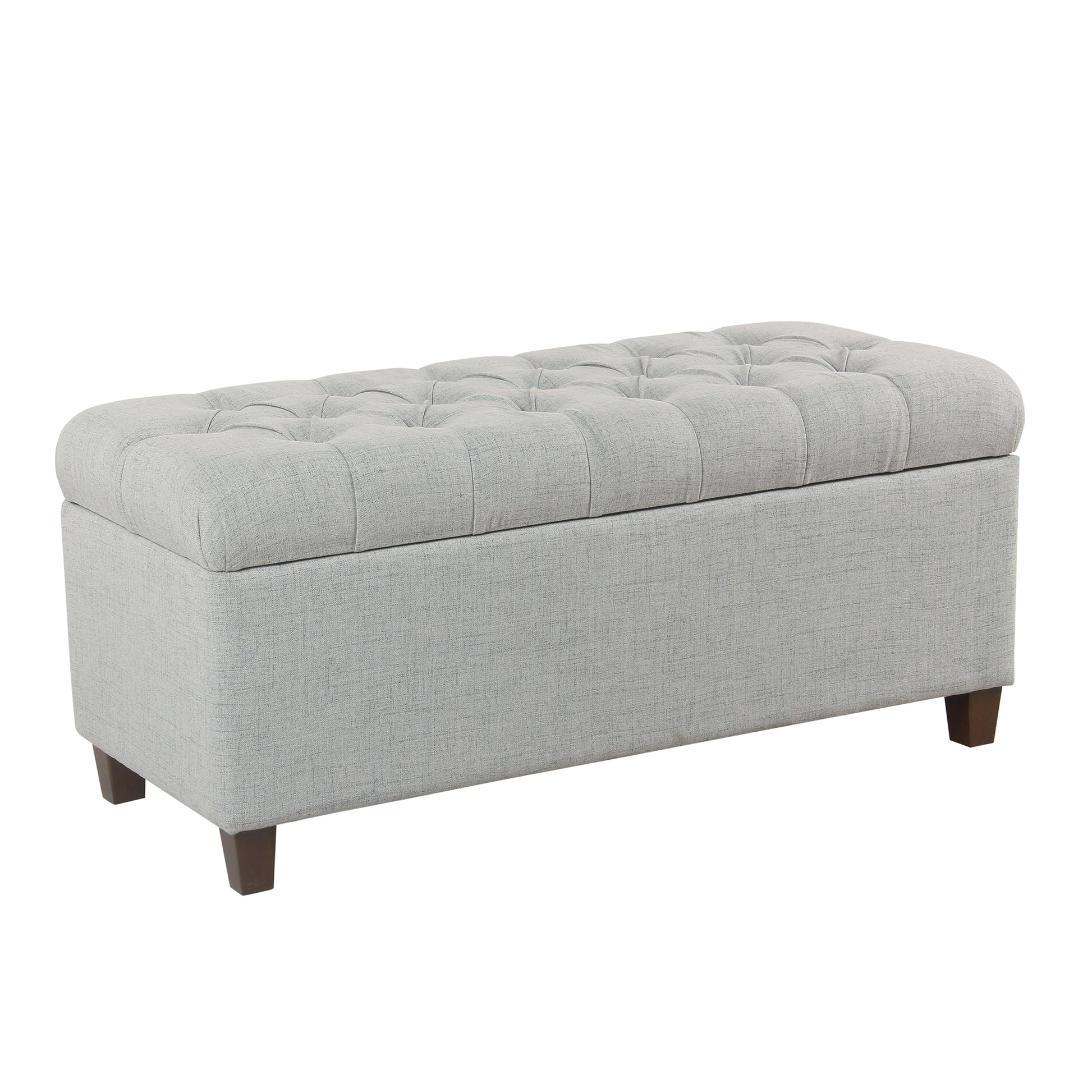 Fabric upholstered button-tufted storage bench by Benzara with hinged storage in light gray linen, brown legs