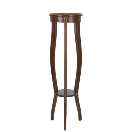 Round pedestal stand in brown wood with open bottom shelf and flared legs