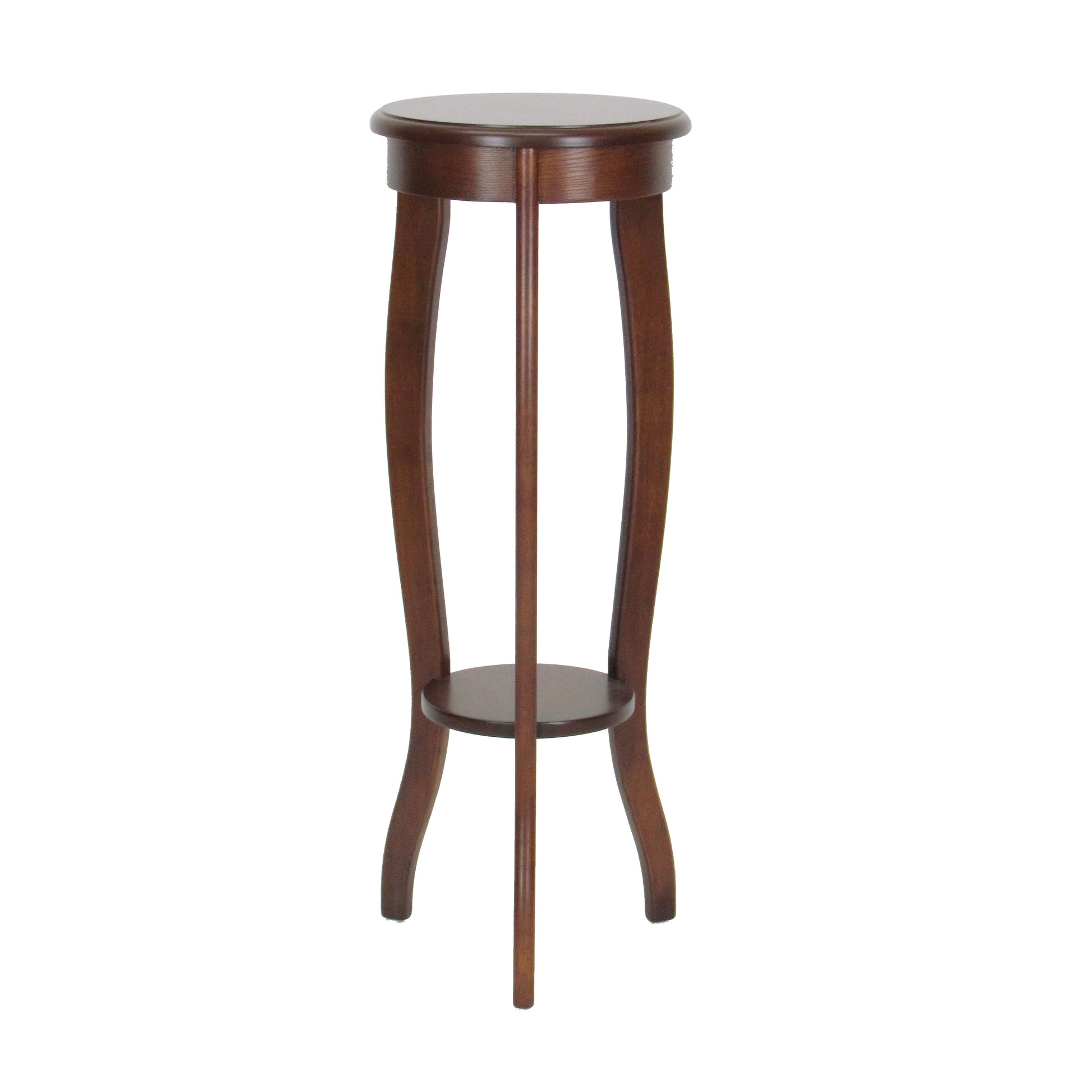 Round pedestal stand in brown wood with open bottom shelf and flared legs, 31.5 inches tall