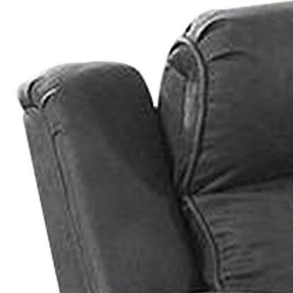 Accent chair arm in gray faux leather with stitched seam.