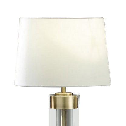 Kria 60 Inch Floor Lamp, Clear Glass Stand, Metal Bands, Antique Brass