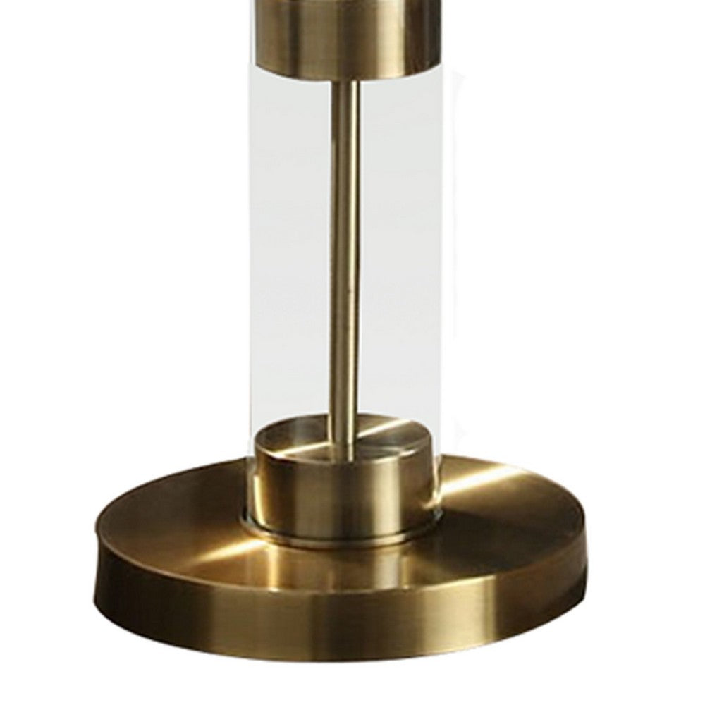 Kria 60 Inch Floor Lamp, Clear Glass Stand, Metal Bands, Antique Brass