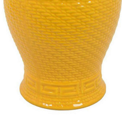 Bryan 18 Inch Ceramic Temple Jar, Geometric Print, Finial Top, Yellow