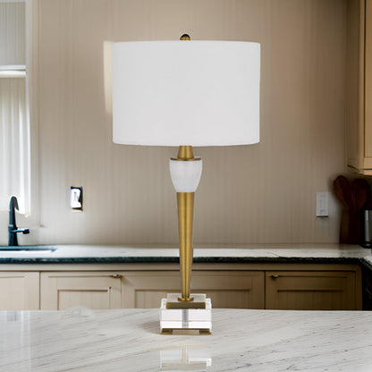 31 Inch Table Lamp with White Drum Shade, Clear Crystal Base, Brass Finish