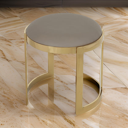 Niyo 19 Inch Ottoman Stool, Round Sand Faux Leather, Stainless Steel, Gold