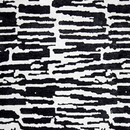 Shawn 5 x 7 Area Rug, Black White Abstract Pattern Polyester