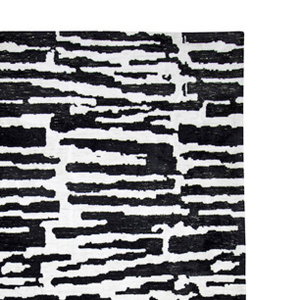 Shawn 5 x 7 Area Rug, Black White Abstract Pattern Polyester