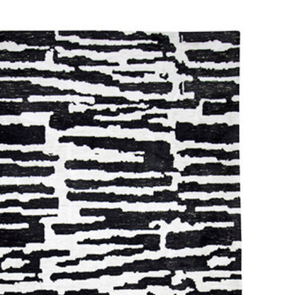 Shawn 5 x 7 Area Rug, Black White Abstract Pattern Polyester