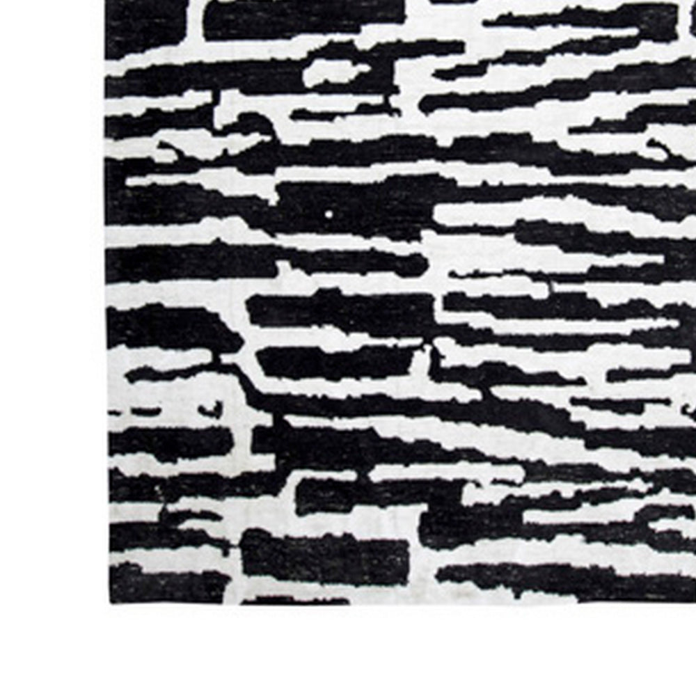 Shawn 5 x 7 Area Rug, Black White Abstract Pattern Polyester