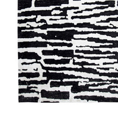 Shawn 5 x 7 Area Rug, Black White Abstract Pattern Polyester
