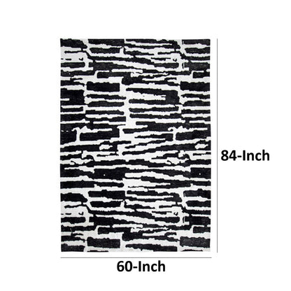 Shawn 5 x 7 Area Rug, Black White Abstract Pattern Polyester