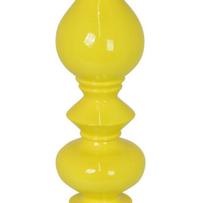 Naze Tabletop Candle Holder with Turned Accents, 23 Inch Yellow Resin