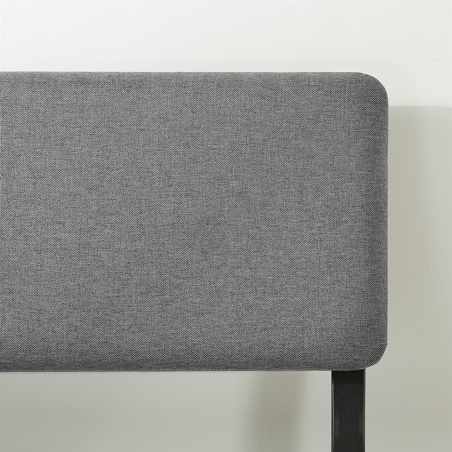 King-size grey soft-fabric headboard with black metal leg for a platform bed