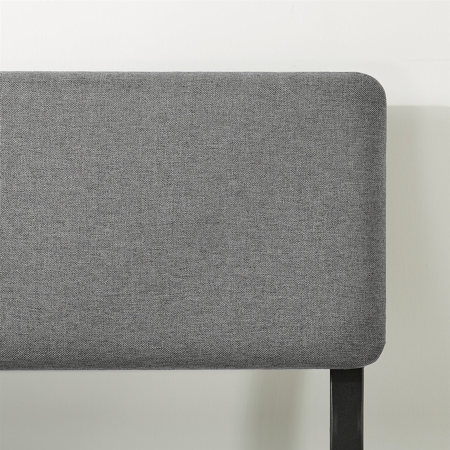 King-size grey soft-fabric headboard with black metal leg for a platform bed