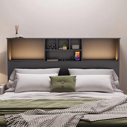 Queen size bed with a black wood finish bookcase headboard and built-in LED lighting
