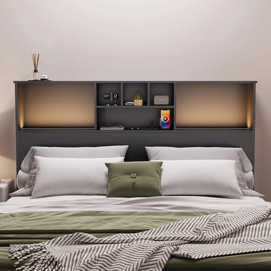 Queen size bed with a black wood finish bookcase headboard and built-in LED lighting