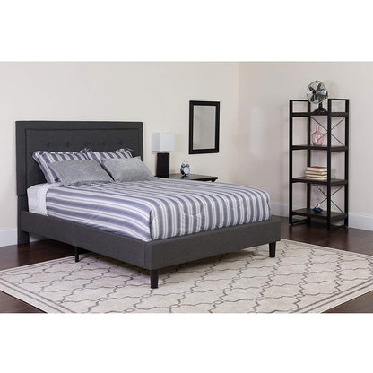 Queen size dark gray fabric upholstered platform bed frame with tufted headboard in a contemporary bedroom