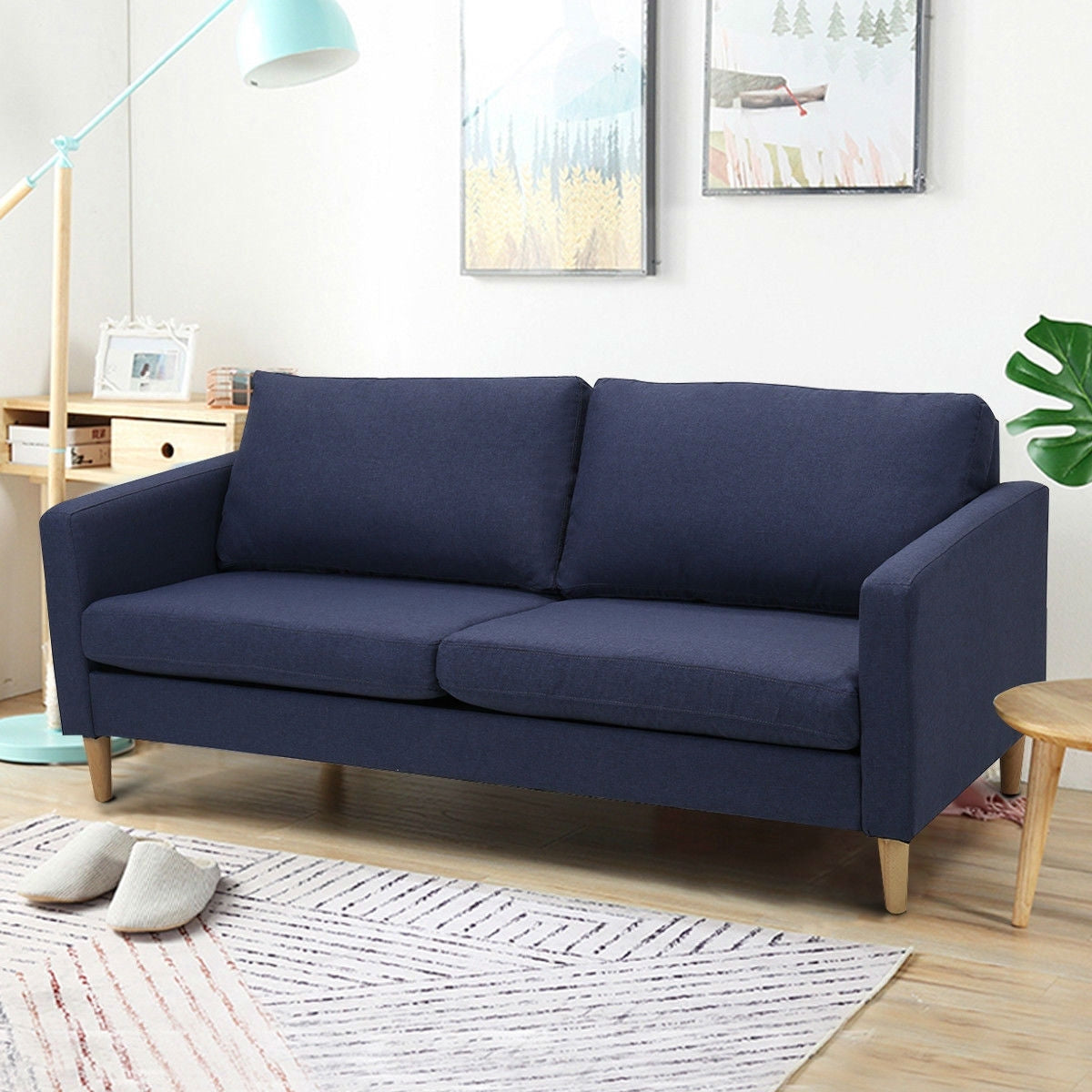 Modern Mid-Century Style Sofa with Wood Legs and Blue Fabric Upholstery