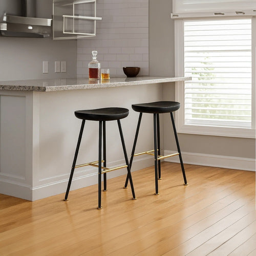 Elira 24" Backless Counter Stool with Mango Wood Saddle Seat | Black Iron Legs | Gold Footrest