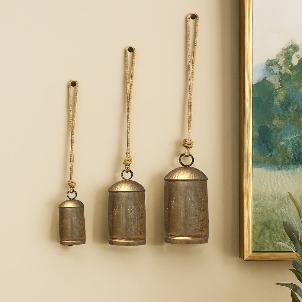 Zaira Decorative Iron Cow Bells Set of 3 | Cylindrical | Antique Gold Finish| Jute Hanging Rope | 20, 15, 12 Inches