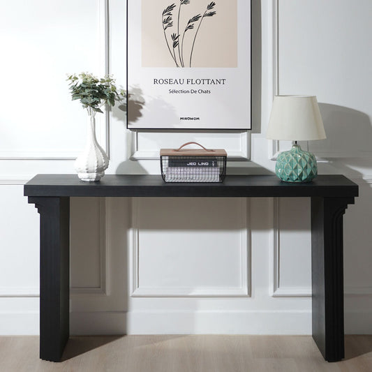 58in modern minimalist black wooden console table with white vase, wire basket, and turquoise lamp