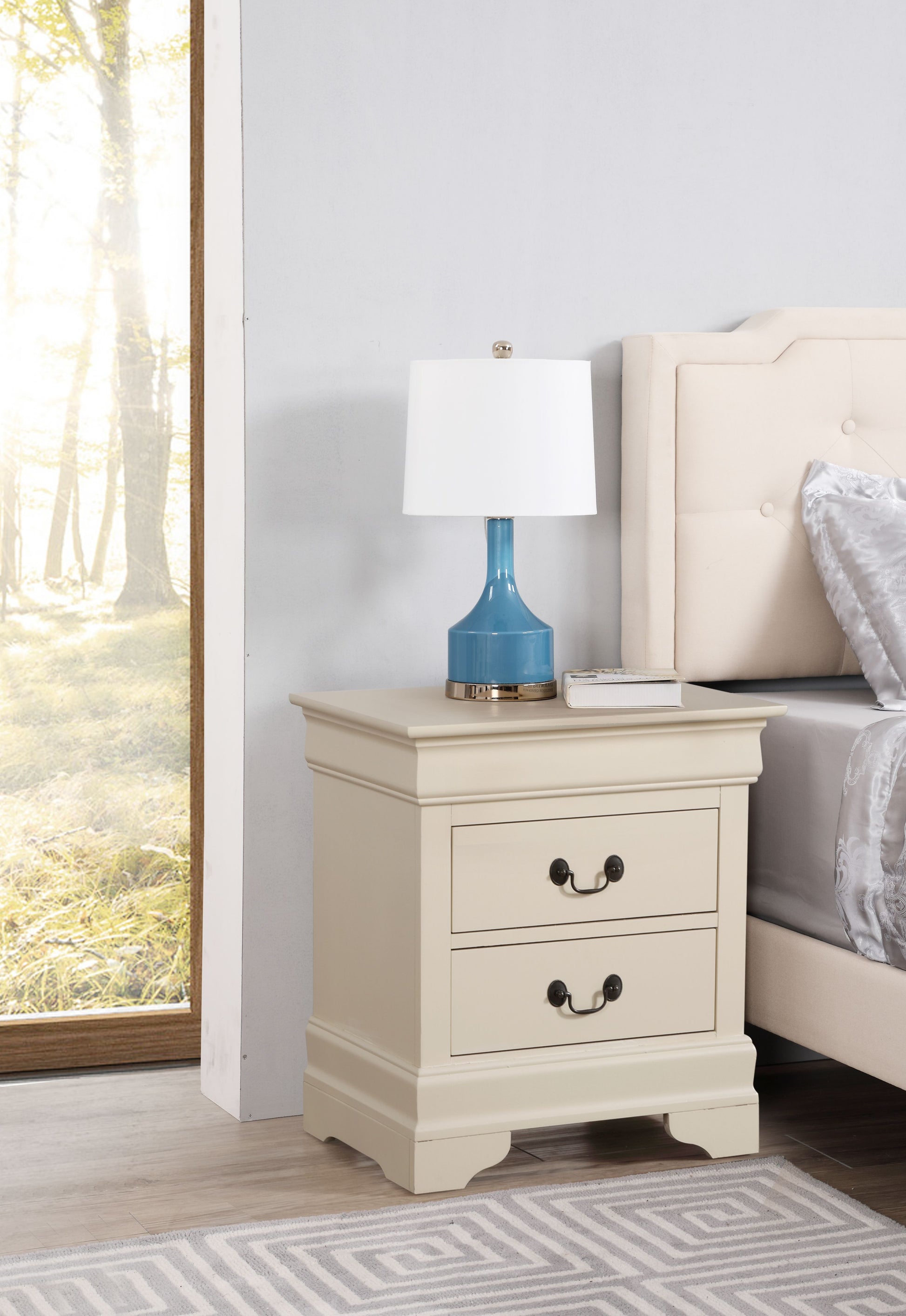 Elegant beige nightstand with classic design, cream finish, two drawers with dark metal handles