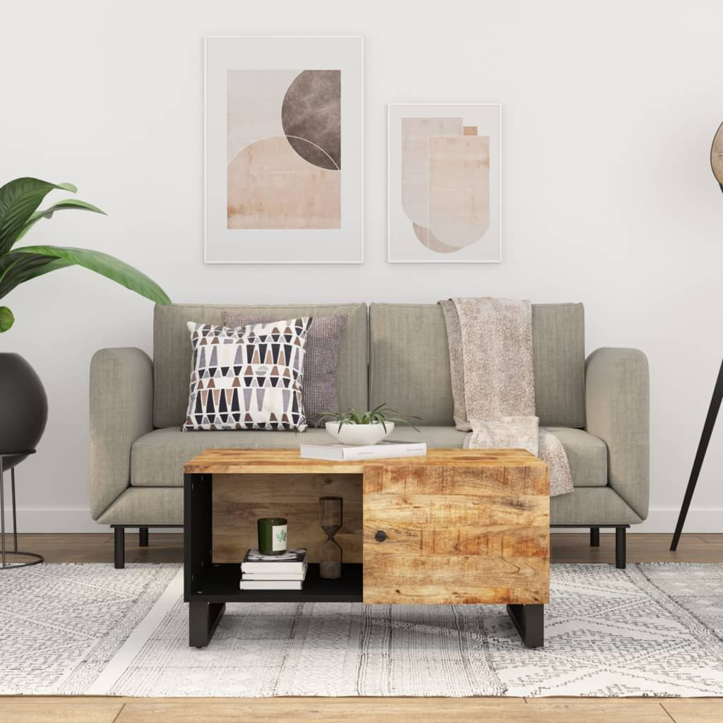 Coffee table with natural wood top and black metal frame with open storage shelf
