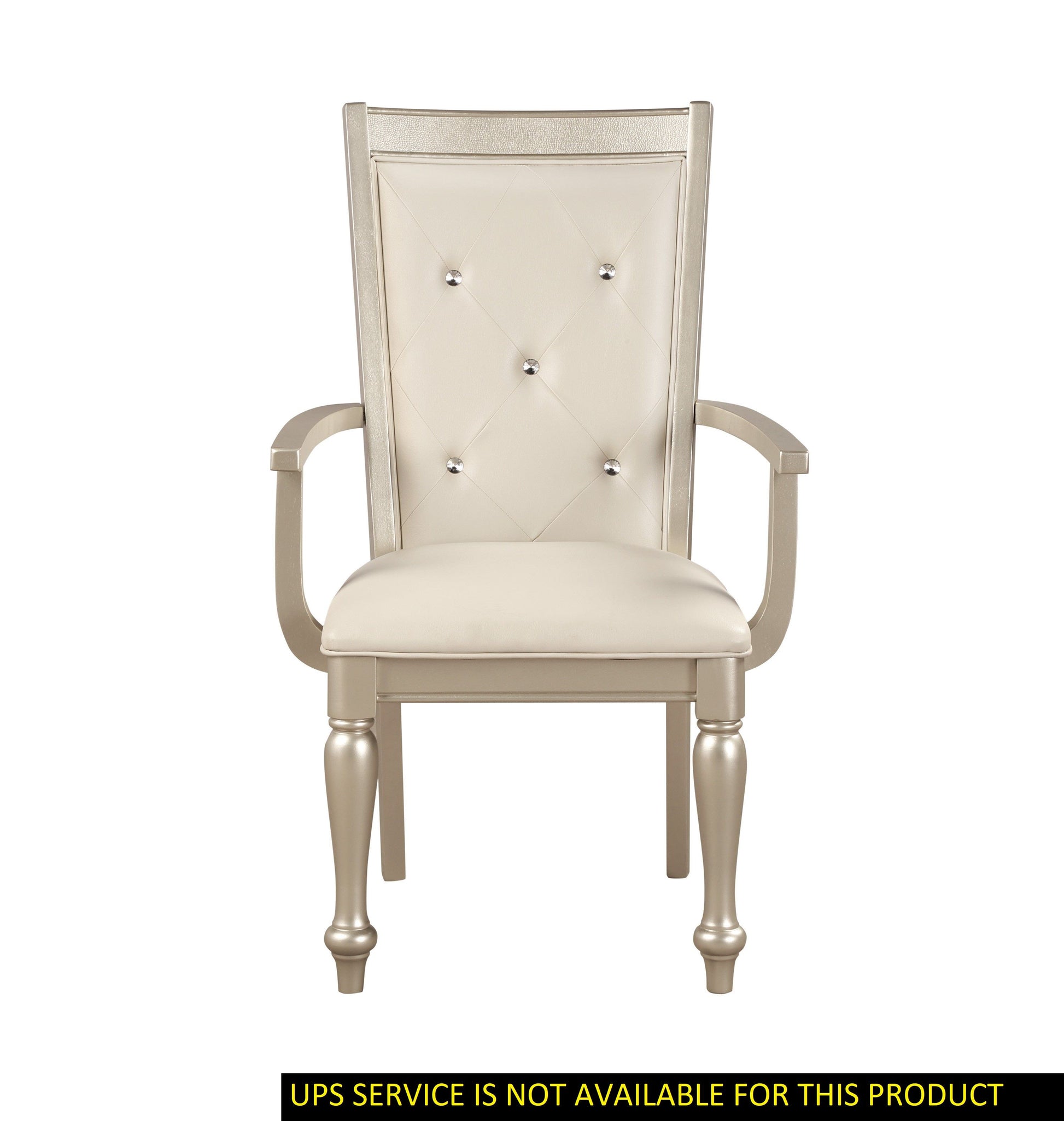 Arm chair with a modern silver finish frame, cream tufted upholstery and crystal button accents