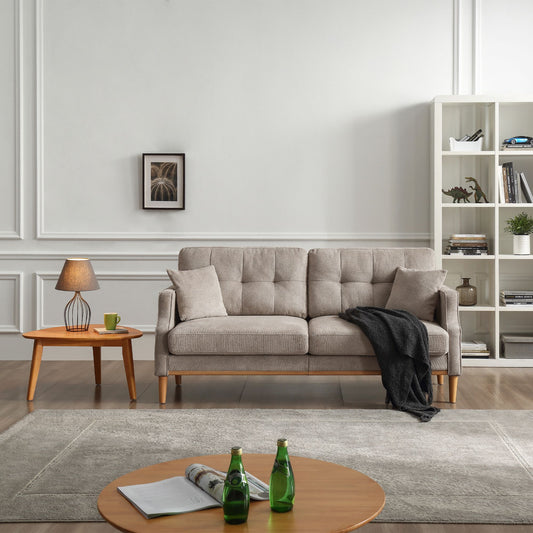 Living Space 3-seat sofa with gray fabric upholstery and wooden legs