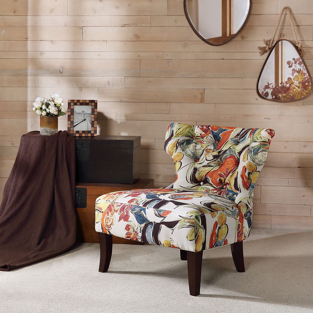Accent chair with vibrant multicolor floral upholstery and dark wood legs.