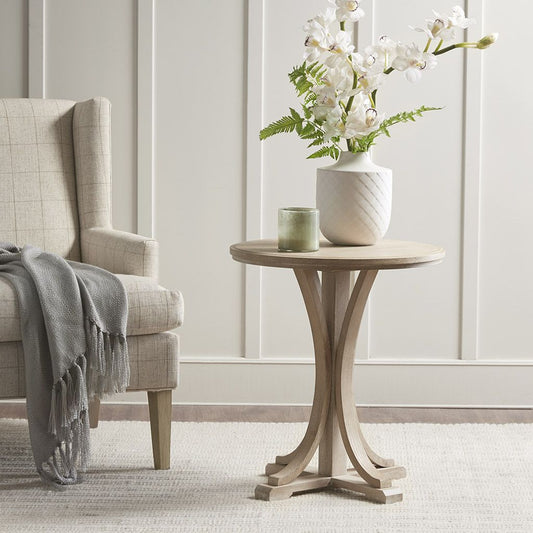 Fatima Accent Table by Doba; light natural wood round top with curved pedestal legs