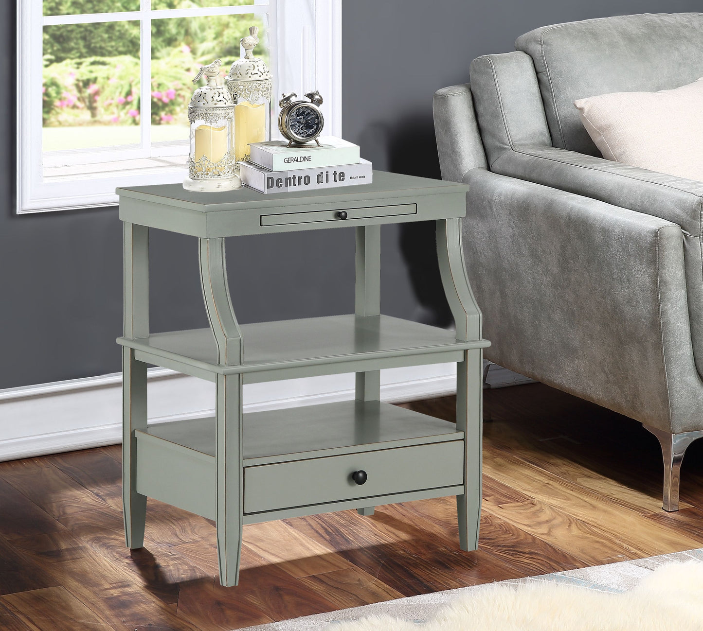 Newland antique grey storage nightstand with drawer and lower shelf, topped by two decorative lanterns and a clock