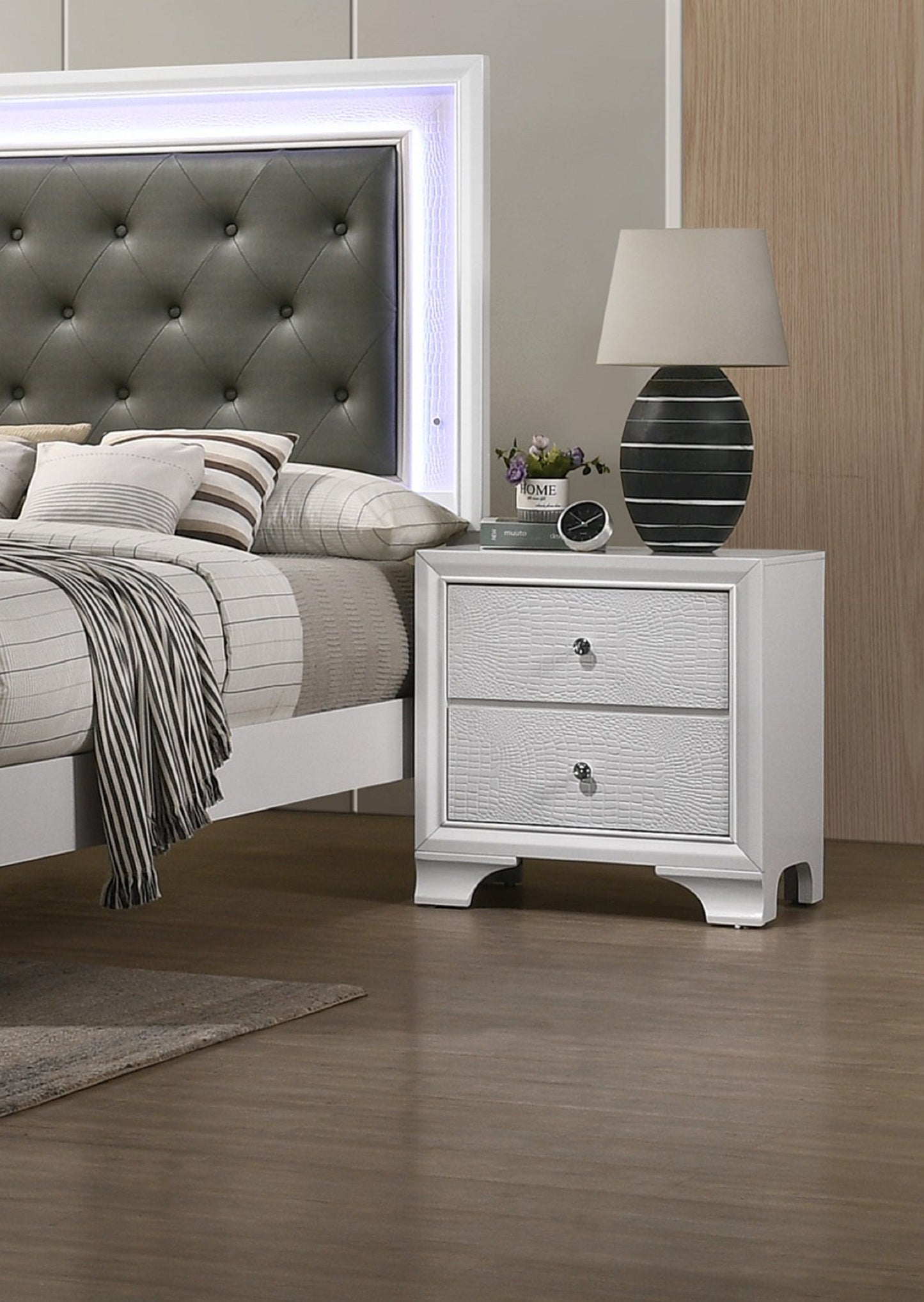 Two-drawer white nightstand with embossed crocodile pattern in modern glam style