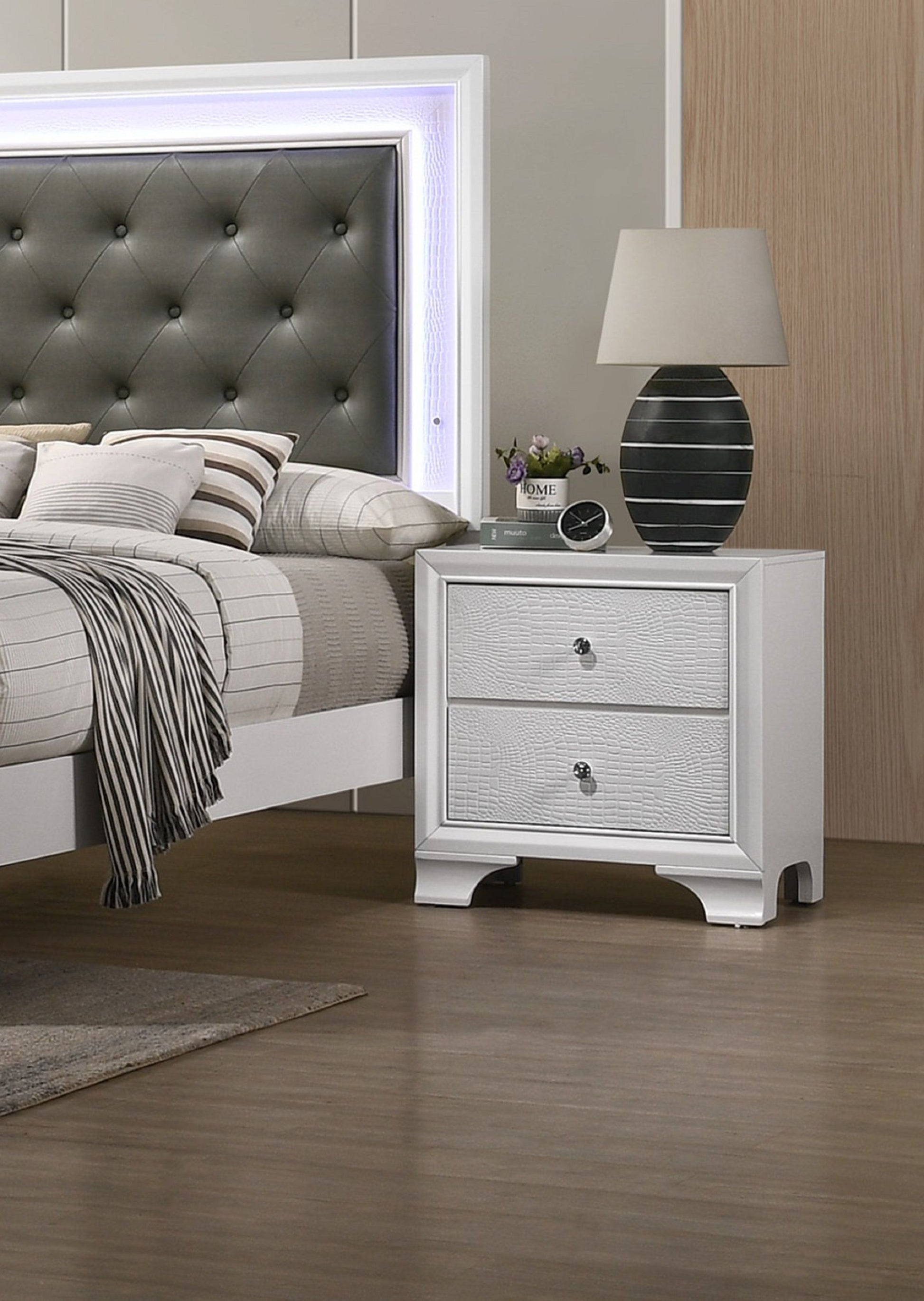 Two-drawer white nightstand with embossed crocodile pattern in modern glam style