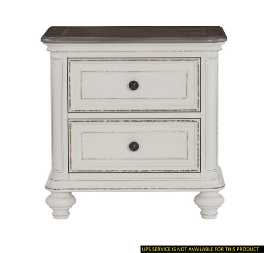 Nightstand with antique white and brown-gray distressed finish, three drawers, black knobs, traditional bedside table