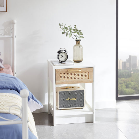 White rattan end table with drawer by Doba; modern nightstand with cane front; Marshall speaker visible.