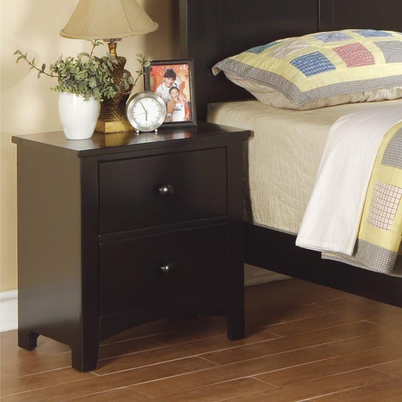 Black finish nightstand with two drawers beside bed, pine veneer over MDF.
