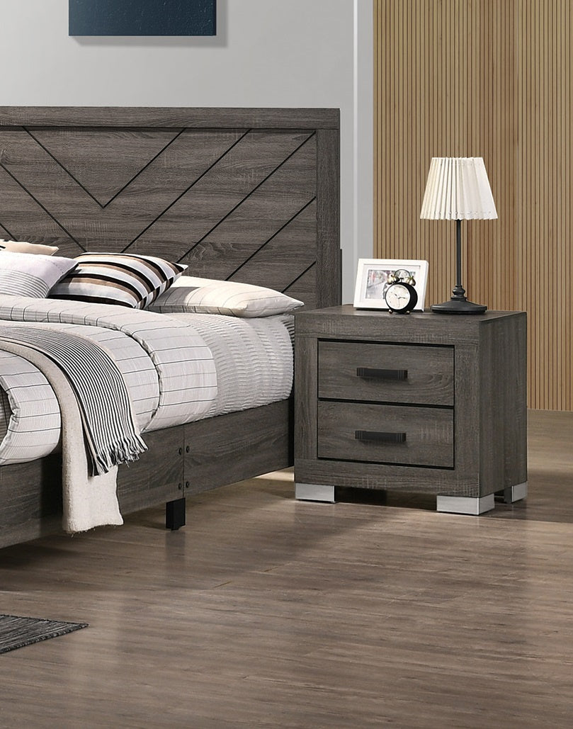 Gray wooden nightstand with two drawers beside a bed in a modern rustic bedroom