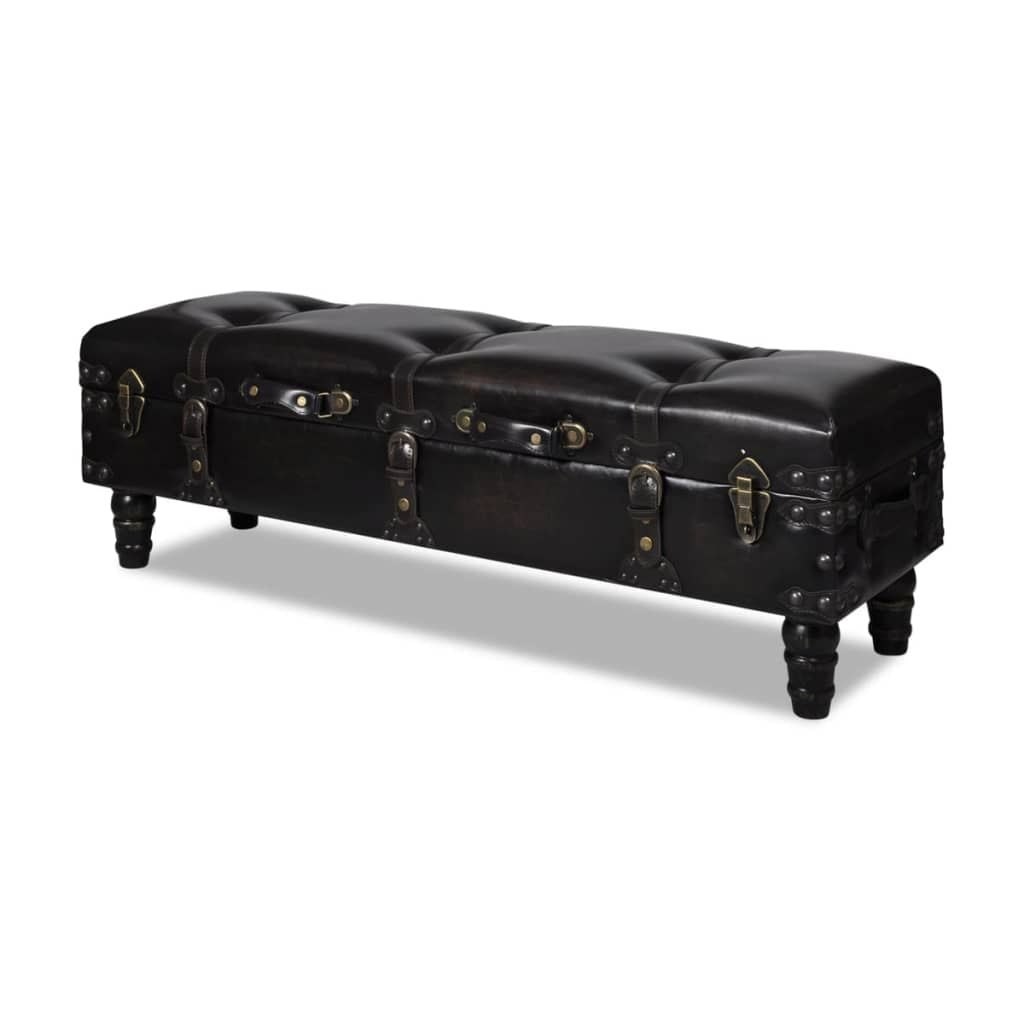 Storage bench in dark brown leather with tufted top and trunk-style hardware with brass accents