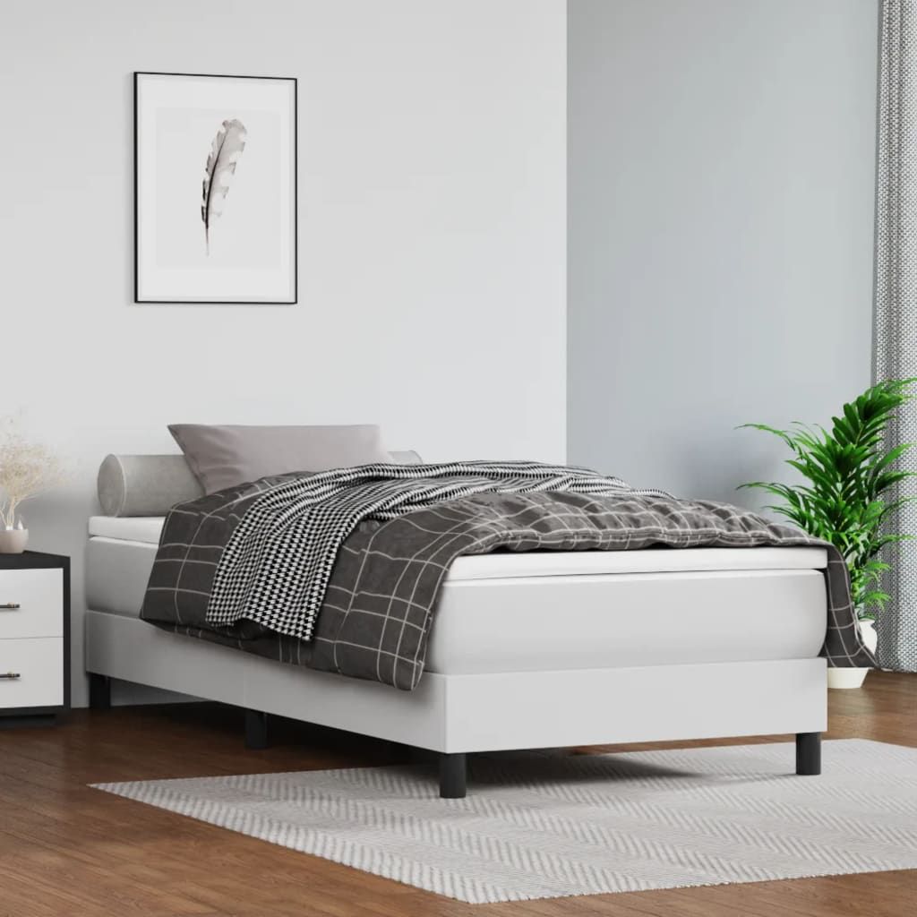 Twin bed frame in white faux leather with plywood and engineered wood, black legs