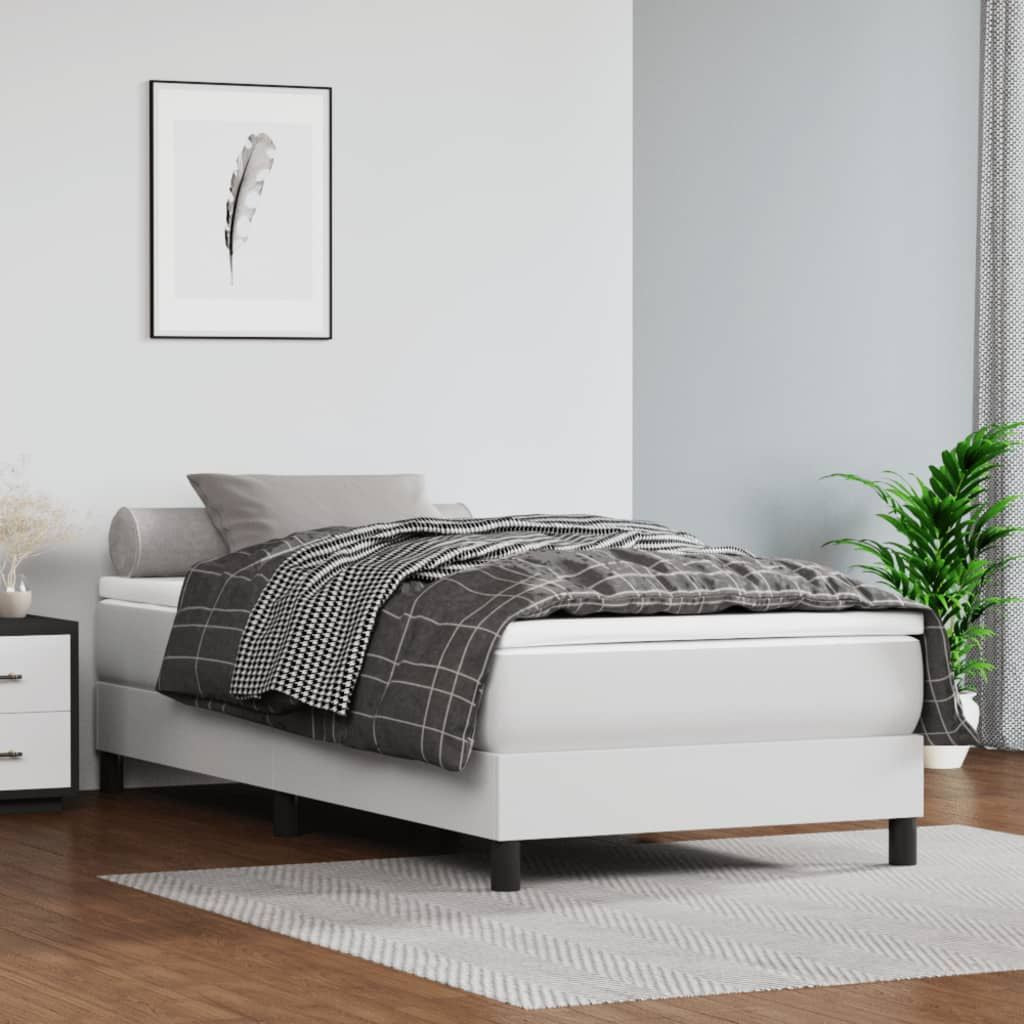Bed frame Twin XL in white faux leather with a low-profile platform and black legs