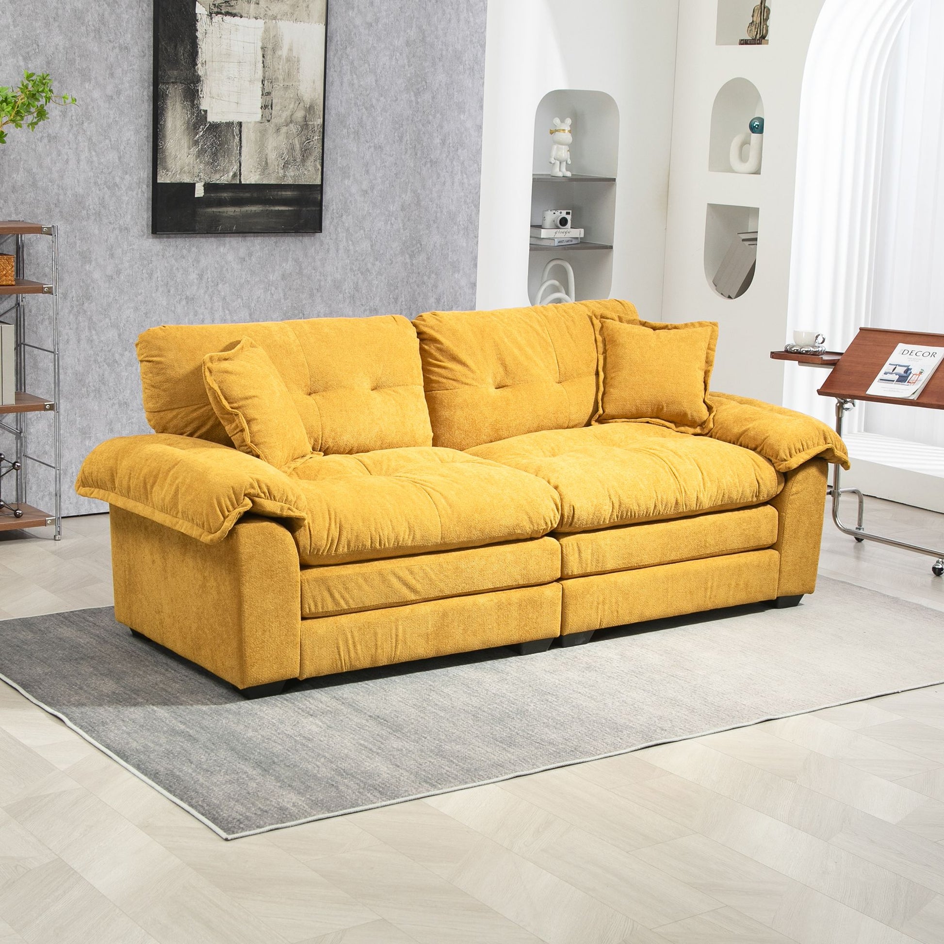 84-inch yellow chenille sofa with 2 throw pillows in a modern living room