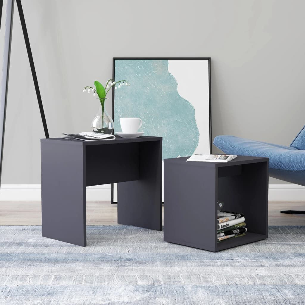 Coffee tables set: two gray engineered-wood, small stackable rectangular tables in modern living room