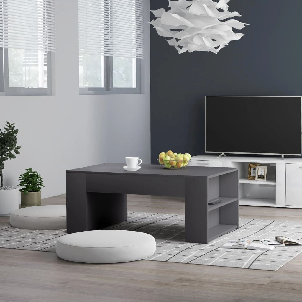 Coffee table, grey engineered wood, medium size with open side shelves for storage.