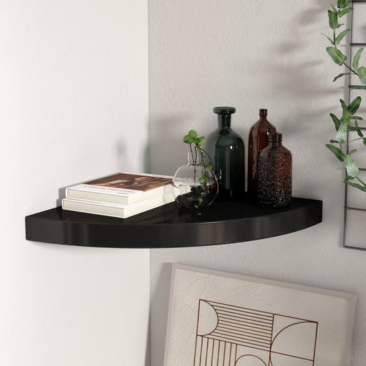 Floating black honeycomb MDF corner shelf, metal; holds 2 books and 3 decorative bottles.
