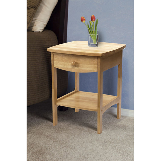 Claire Accent Table, natural wood finish with drawer and lower shelf, topped by a glass vase with three tulips