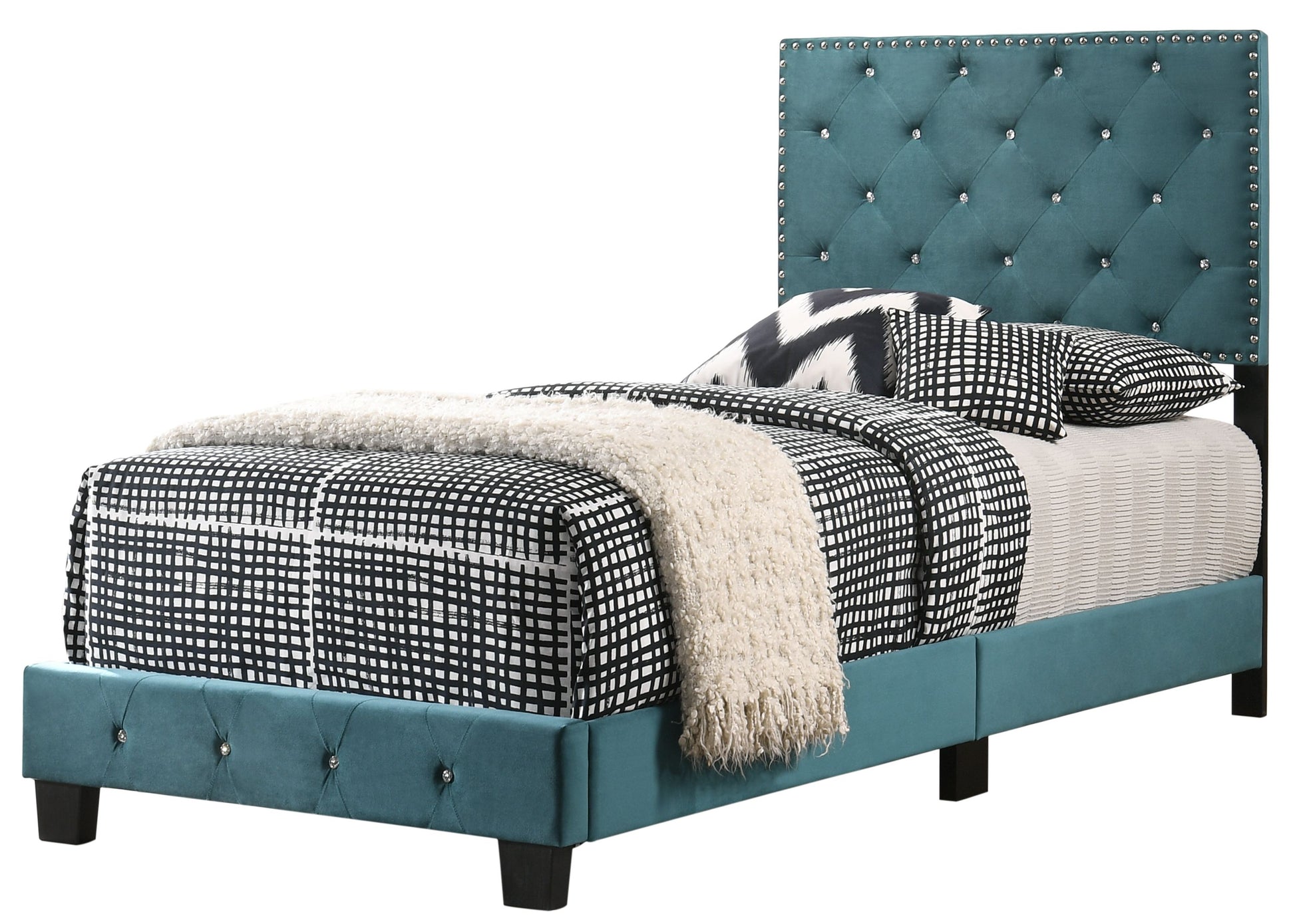 Charming twin bed with teal tufted headboard, crystal stud accents, and geometric black-and-white bedding